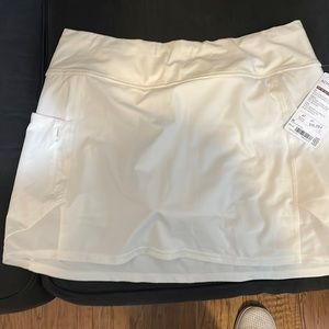 Athleta Action Skort - with side pockets - size M new with tags
